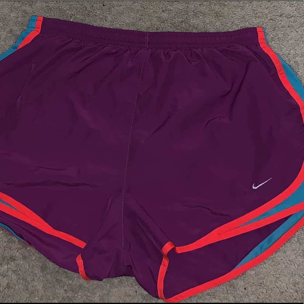 women’s purple orange and blue nike shorts